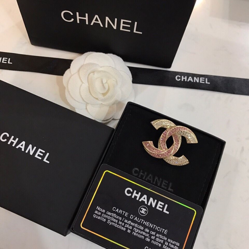 Ch**el brooches